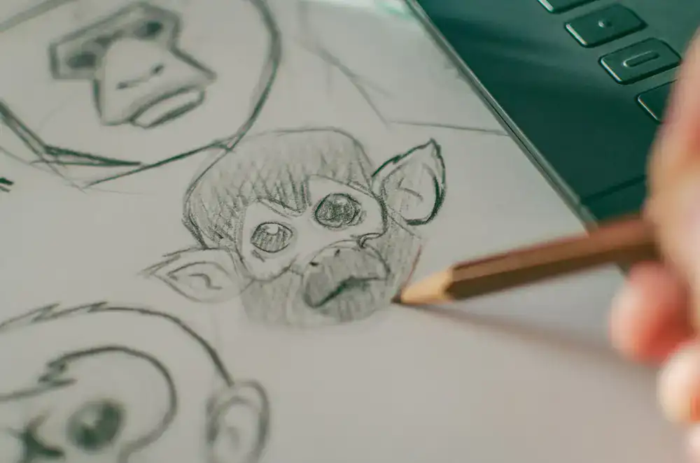 The creative design team at Tapland Studio sketching game characters